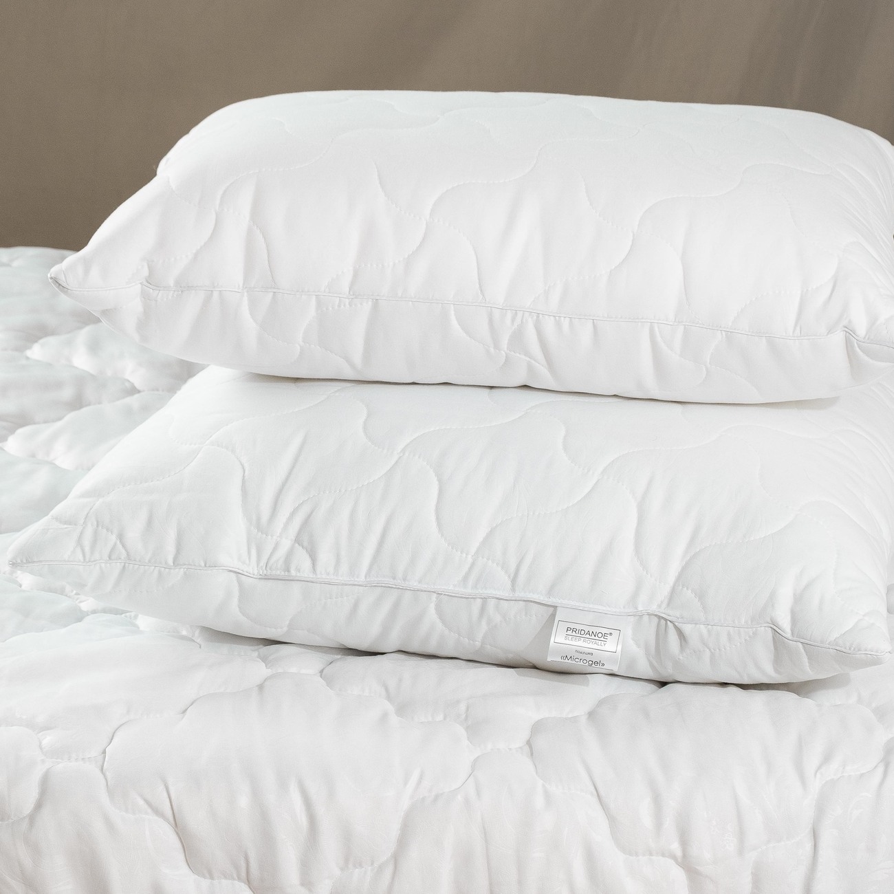 Подушка микрогель купить. Микрогель в подушках что это. Подушки из микрогеля. Микрогель наполнитель одеяла. Mikrojel волокно для подушек и одеял.