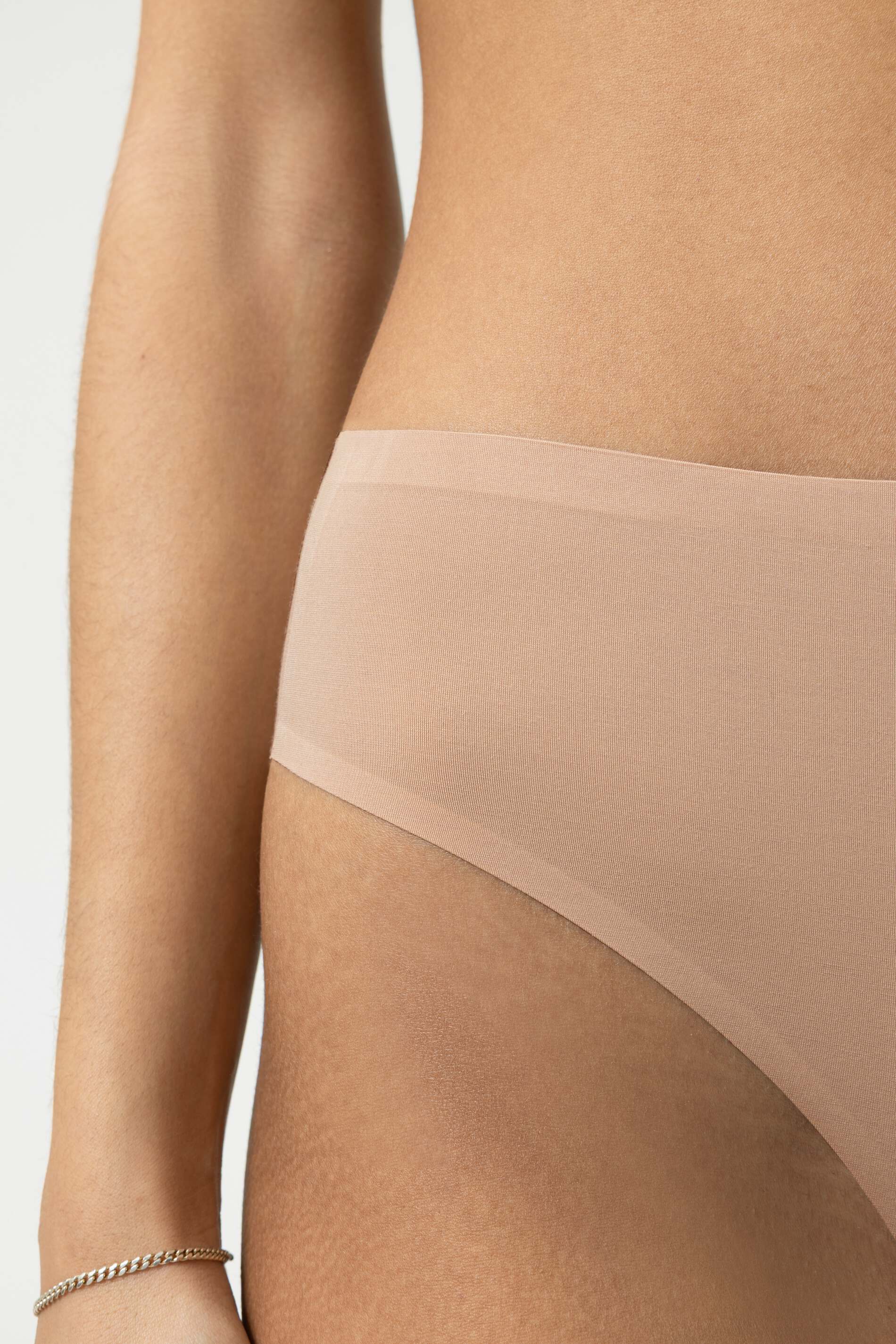 MEY (Simply better invisibles) Трусы thong с выс. талией «Cream tan»